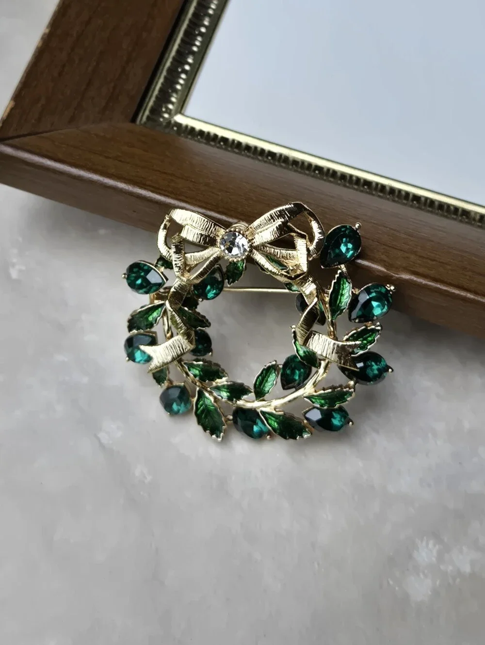 Napier Gold Tone Wreath Brooch with Emerald Green Stones